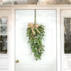 New National Tree Company , Hgtv Home Collection, 30" Winter Garden Eucalyptus Mixed Tip Swag With A Burlap Bow, 30 Led Lights- Battery Operated With Timer