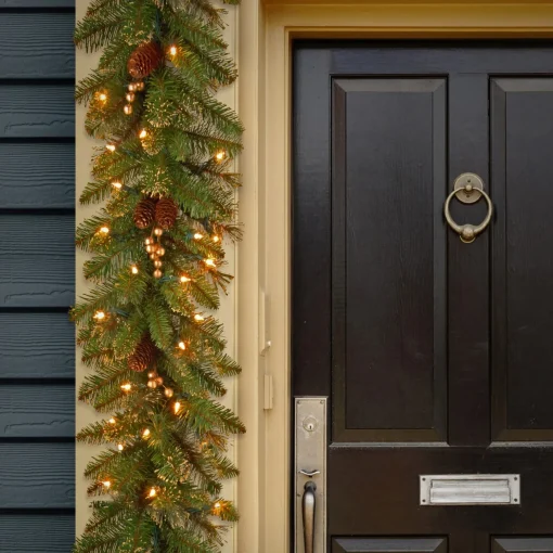 Outlet National Tree Company Pre-Lit Artificial Christmas Garland, Green, Glittery Pine, White Lights, Decorated With Pine Cones, Berry Clusters, Plug In, Christmas Collection, 9 Feet