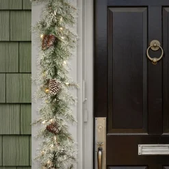 New National Tree Company Pre-Lit 'Feel Real' Artificial Christmas Garland, Green, Mountain Spruce, White Lights, Decorated With Pine Cones, Frosted Branches, Berry Clusters, Plug In, Christmas Collection, 9 Feet