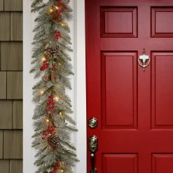 Store National Tree Company Pre-Lit Artificial Christmas Garland, Green, Snowy Bristle Berry, White Lights, Decorated With Pine Cones, Berry Clusters, Plug In, Christmas Collection, 9 Feet