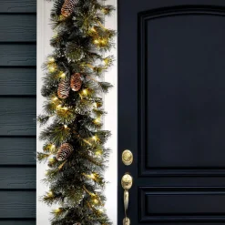Store National Tree Company Pre-Lit Artificial Christmas Garland, Green, Glittery Pine, White Lights, Decorated With Pine Cones, Snow Flakes, Frosted Branches, Plug In, Christmas Collection, 9 Feet