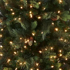 Online National Tree Company Pre-Lit Artificial Giant Slim Christmas Tree, Green, Carolina Pine, White Lights, Flocked With Pine Cones, Includes Stand, 12 Feet