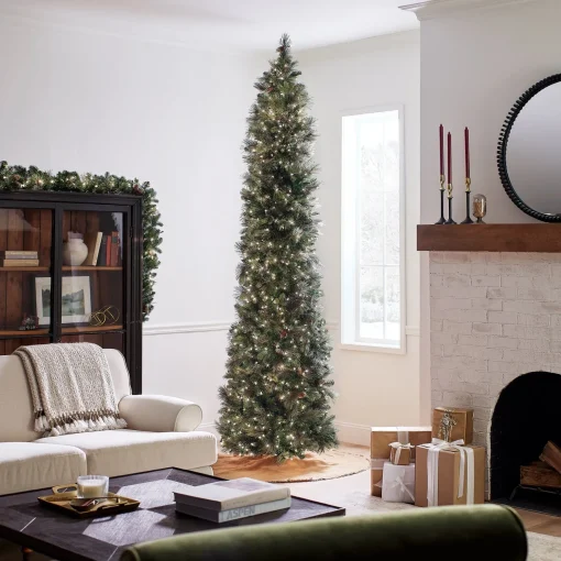 Clearance National Tree Company Pre-Lit 'Feel Real' Artificial Giant Christmas Tree, Green, Carolina Pine, White Lights, Flocked With Pine Cones, Includes Stand, 10 Feet