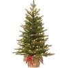 New National Tree Company Pre-Lit 'Feel Real' Artificial Mini Christmas Tree, Green, Nordic Spruce, White Lights, Includes Burlap Bag Base, 3 Feet