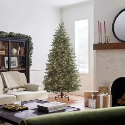 Clearance National Tree Company Pre-Lit 'Feel Real' Artificial Slim Christmas Tree, Green, Nordic Spruce, White Lights, Includes Stand, 7.5 Feet